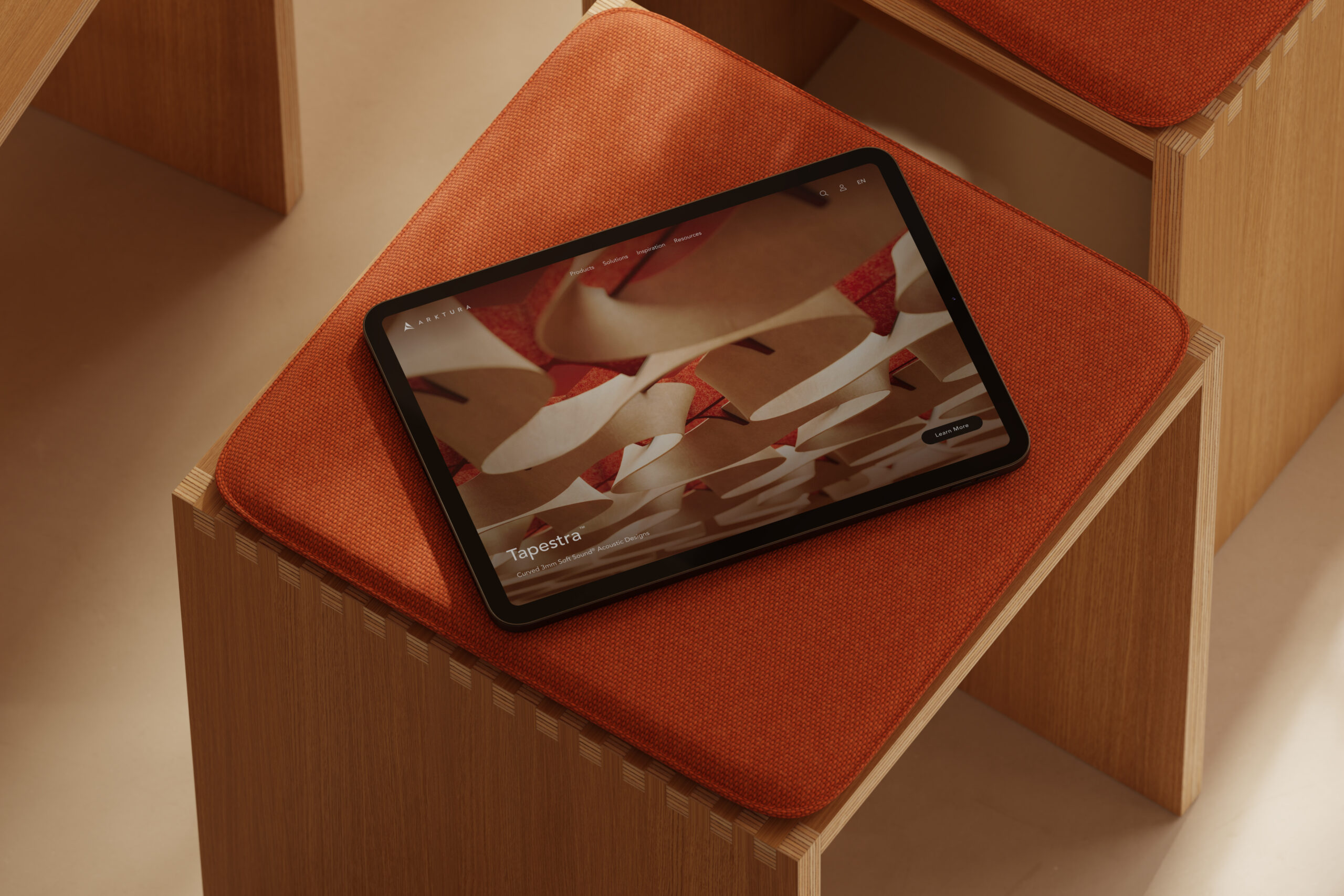 WHQ Arktura homepage on ipad on fabric bench