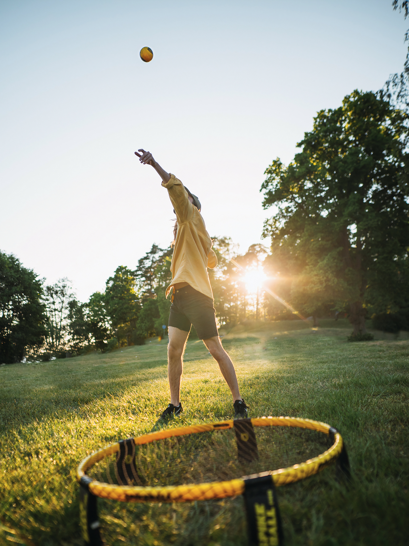 Spikeball player spike