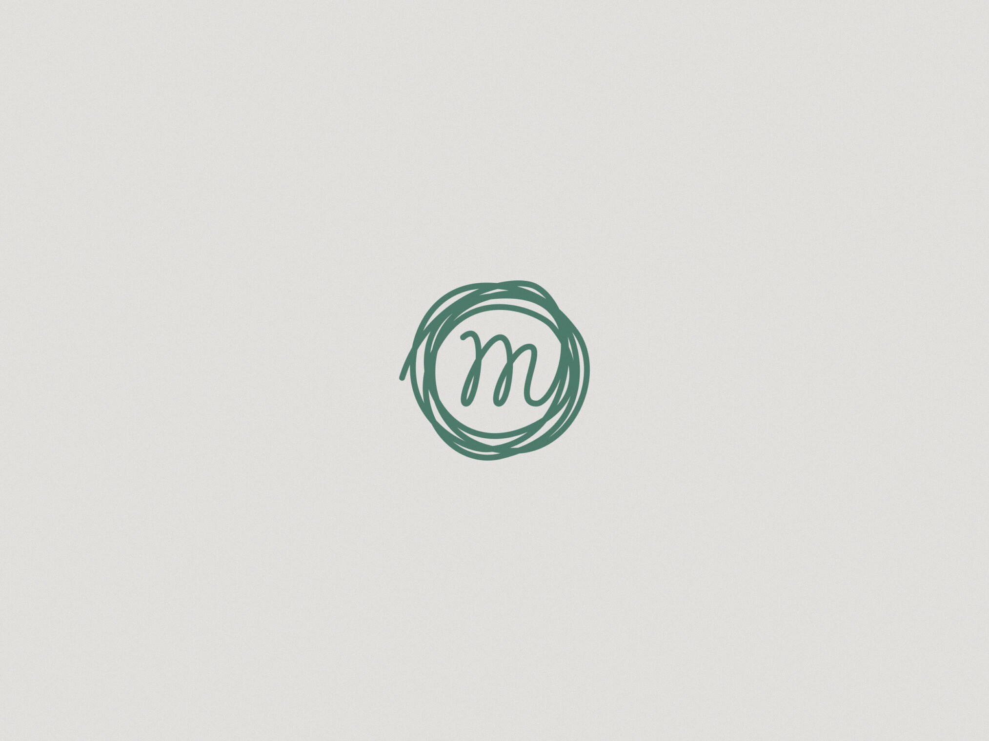 Minimalist green cursive letter M enclosed in a hand-drawn circle logo.