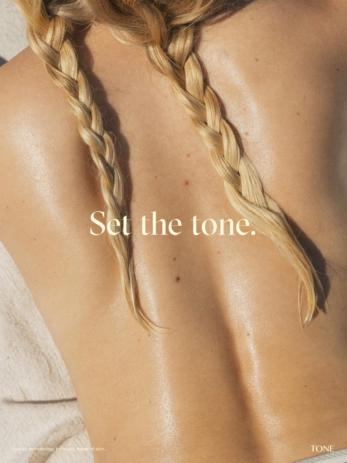 Tone poster showing a sunlit, hydrated back with blonde braids and brand text.