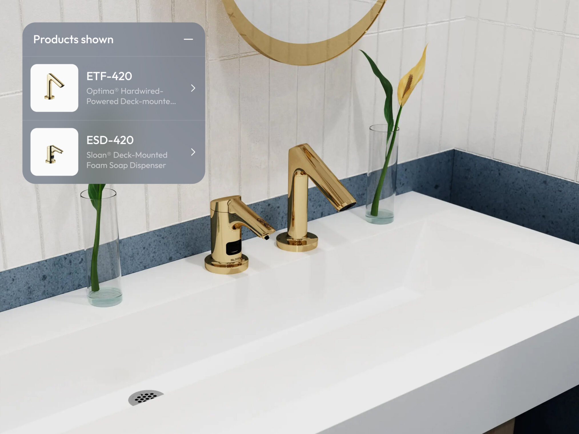 Gold Sloan faucet and matching soap dispenser on a white bathroom sink.